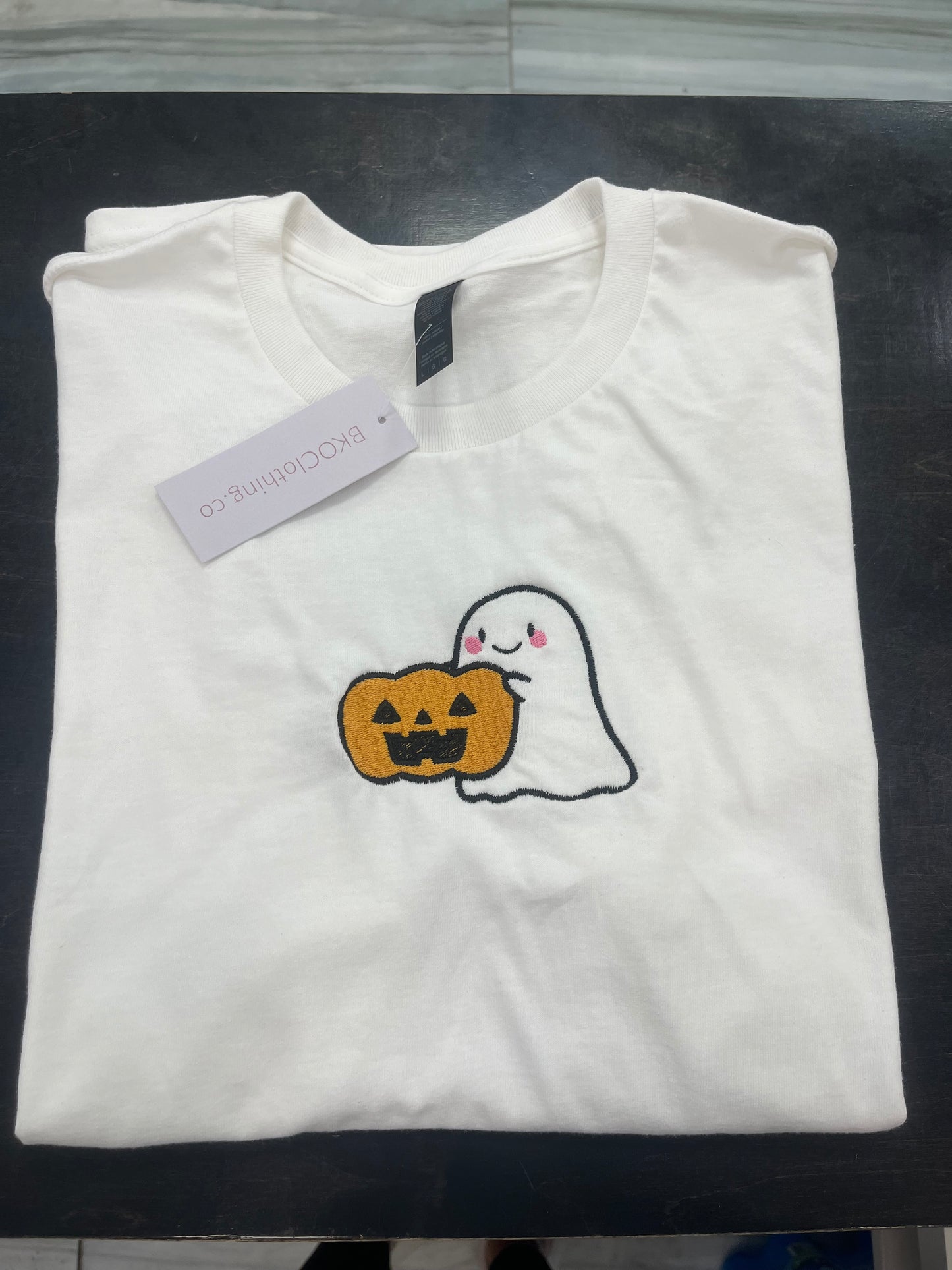 Ghost holding pumpkin tshirt - BKOClothing.co